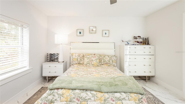 bedroom featuring ceiling fan