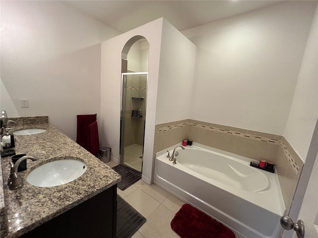 bathroom with vanity, separate shower and tub, and tile patterned flooring