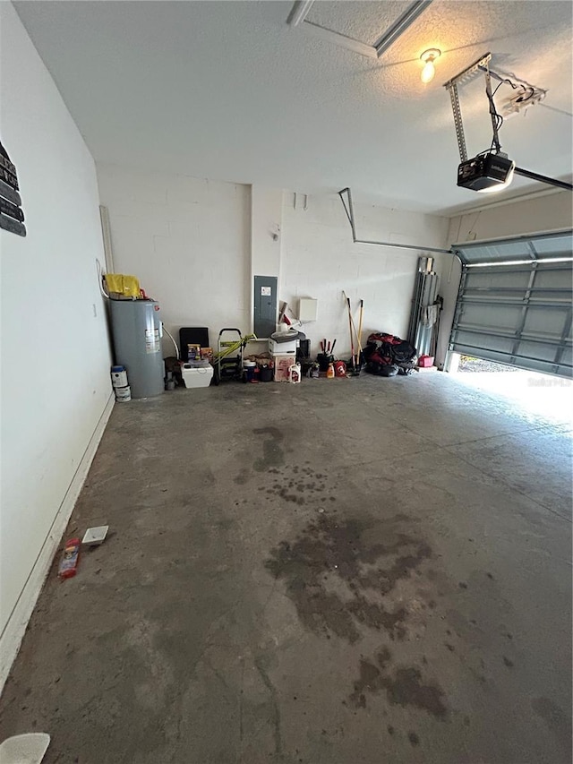 garage featuring a garage door opener, electric panel, and water heater