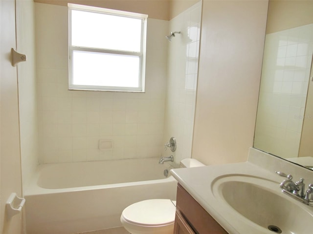 full bathroom with bathtub / shower combination, toilet, and vanity