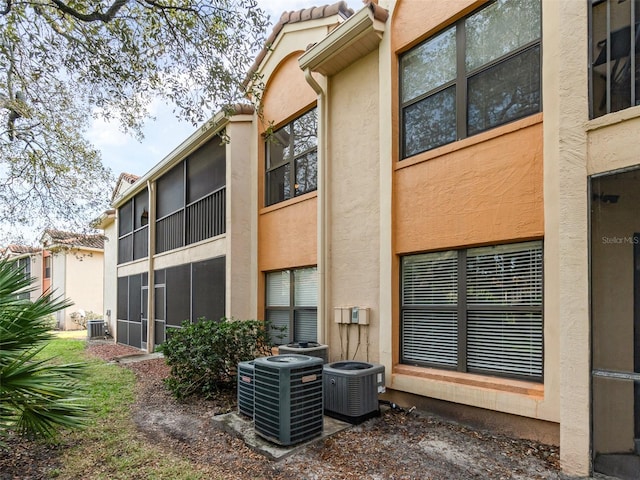 view of property with central air condition unit