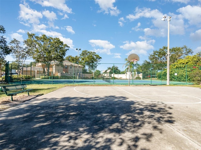 exterior space with tennis court