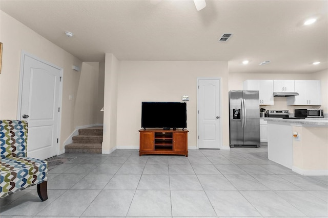 living room featuring light tile patterned flooring