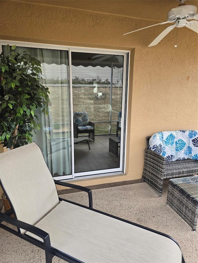 view of patio / terrace with ceiling fan