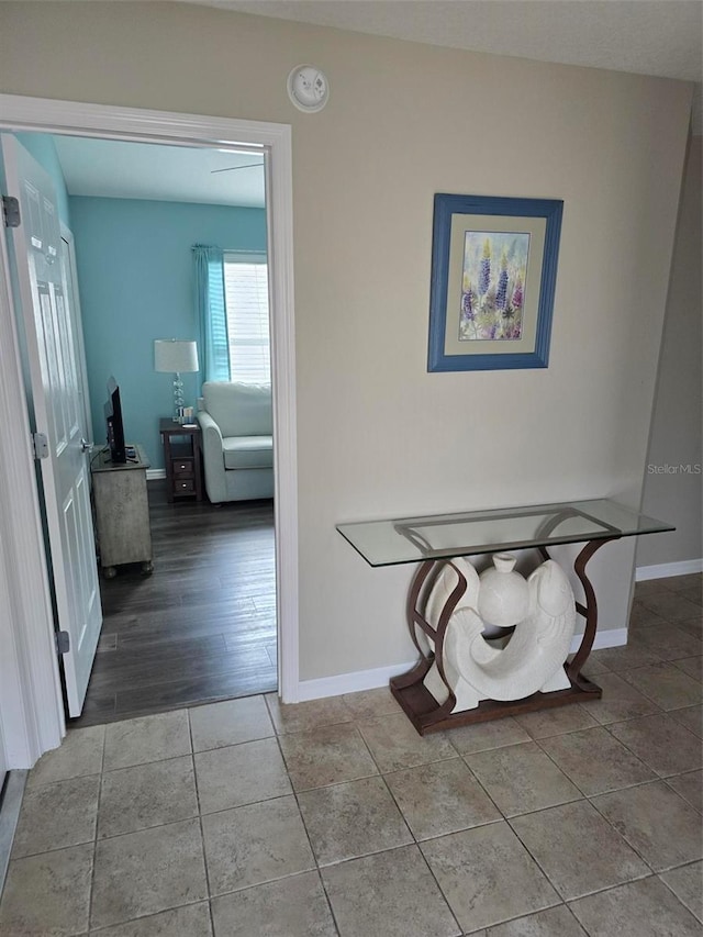 hallway with light tile patterned flooring