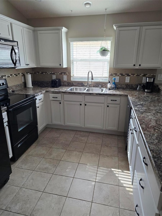 kitchen with white cabinets, sink, and black appliances