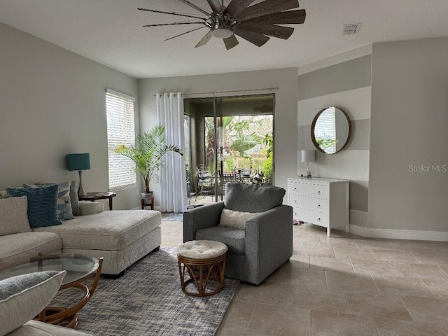 living room featuring ceiling fan