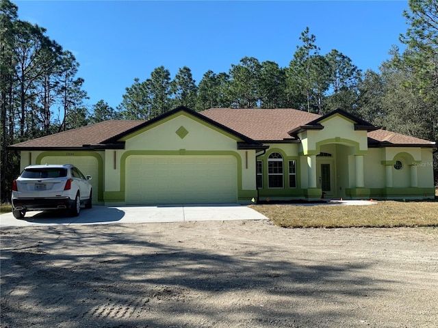 view of front of home featuring a garage