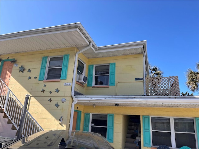 view of home's exterior with cooling unit