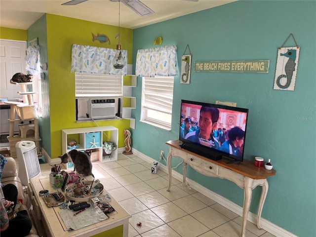 tiled living room featuring ceiling fan