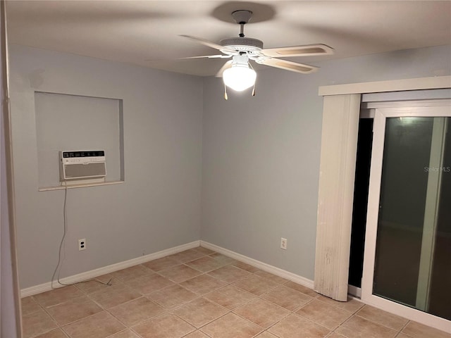 spare room featuring light tile patterned flooring, a wall mounted AC, and ceiling fan