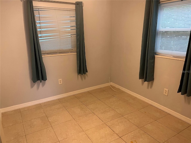 view of tiled spare room