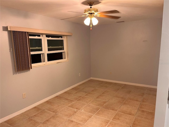 empty room featuring ceiling fan