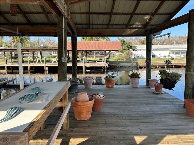 dock area with a water view