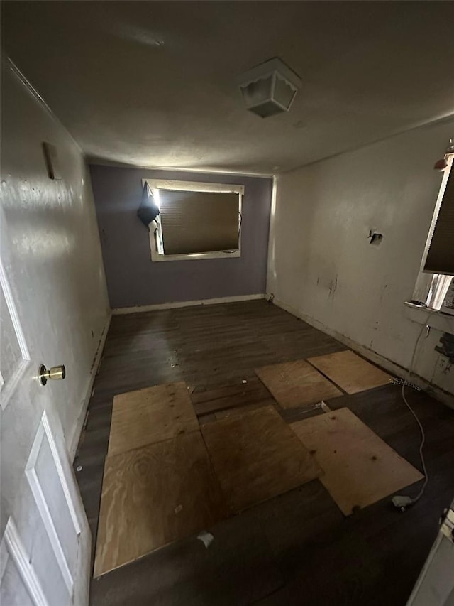 bathroom with hardwood / wood-style floors