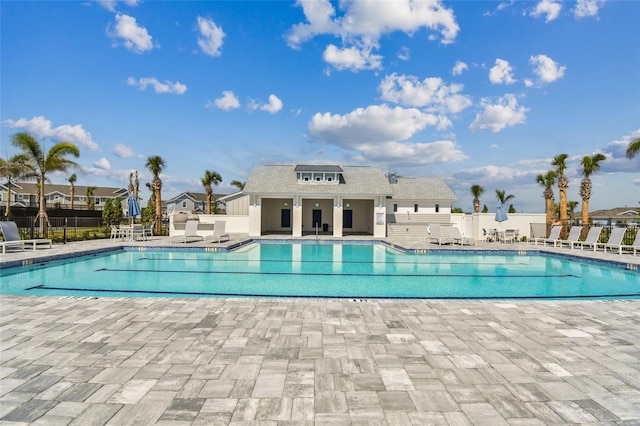 view of swimming pool with a patio area