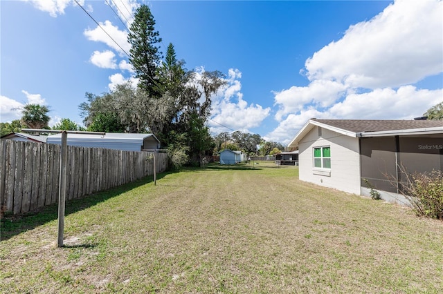 view of yard with fence