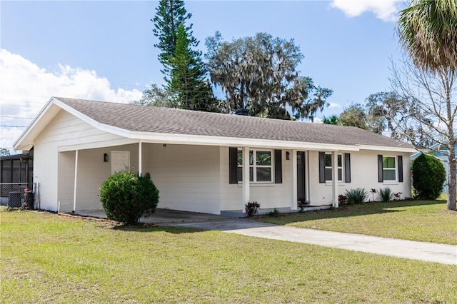 single story home with a shingled roof and a front lawn