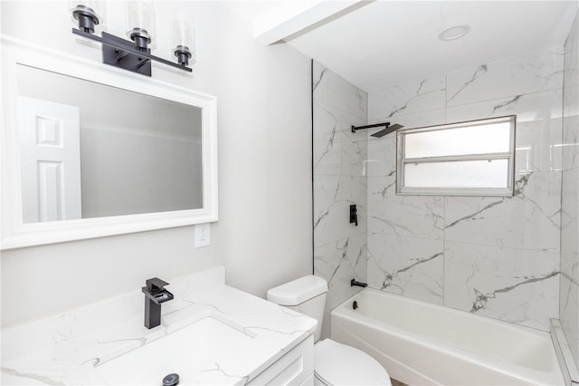 bathroom with vanity, toilet, and shower / bathtub combination