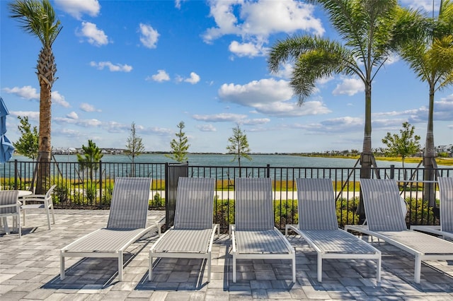 view of patio featuring a water view