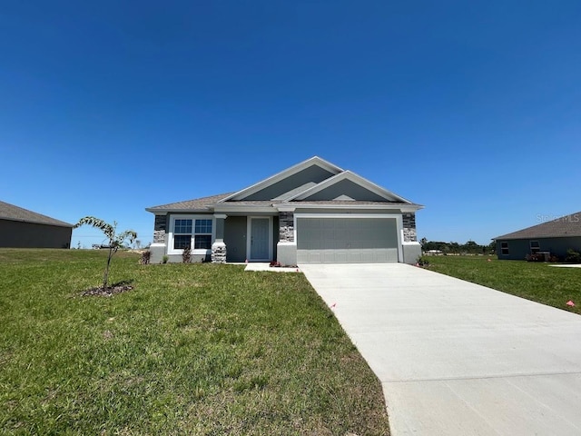 1212 Caloosa Ridge Ave, Babson Park, FL 33827 - ranch-style home with an attached garage, concrete driveway, and a front lawn