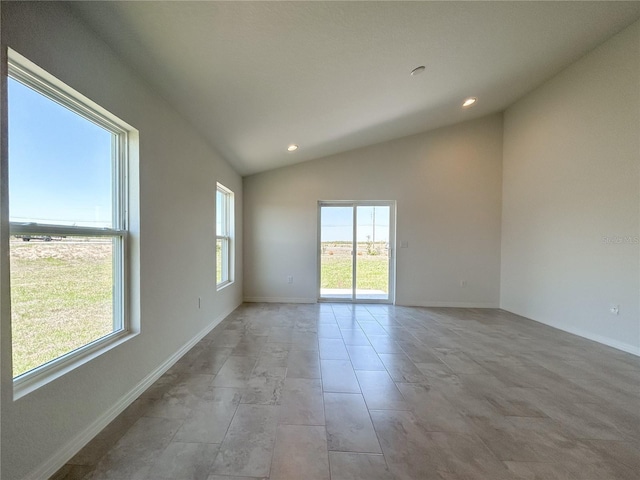 1212 Caloosa Ridge Ave, Babson Park, FL 33827 - empty room with vaulted ceiling, recessed lighting, and baseboards