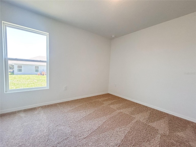 1212 Caloosa Ridge Ave, Babson Park, FL 33827 - empty room featuring light colored carpet and baseboards