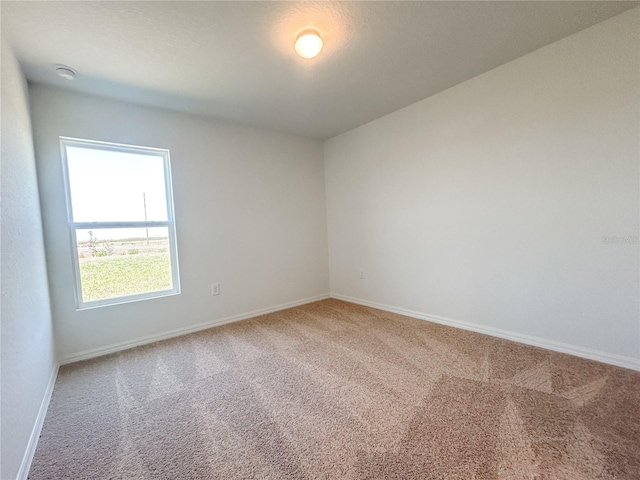 1212 Caloosa Ridge Ave, Babson Park, FL 33827 - carpeted empty room featuring baseboards and a smoke detector