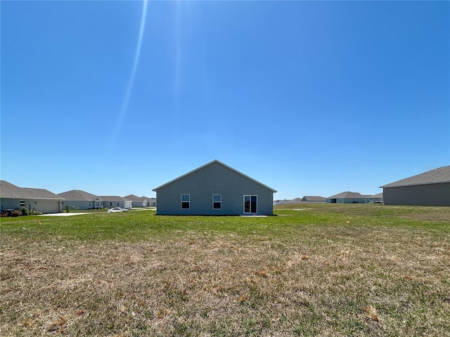 1212 Caloosa Ridge Ave, Babson Park, FL 33827 - view of side of property with a lawn