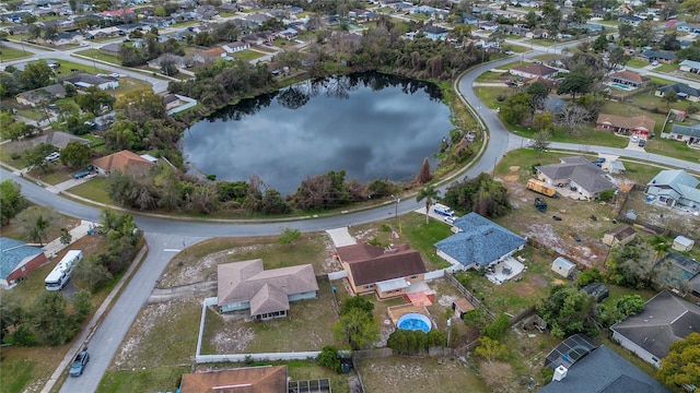 aerial view featuring a water view and a residential view