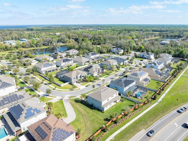 aerial view featuring a water view and a residential view