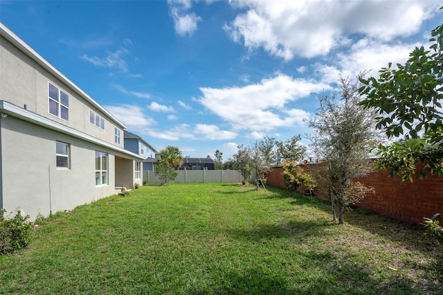 view of yard featuring a fenced backyard