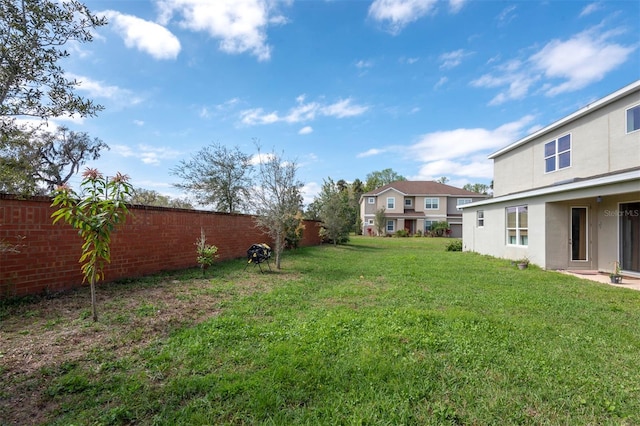 view of yard featuring a fenced backyard