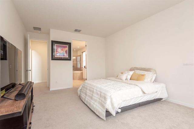 bedroom featuring baseboards, visible vents, and light colored carpet