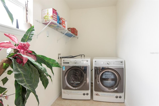 laundry area with laundry area and washer and dryer