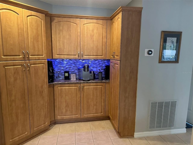 interior details with backsplash and visible vents