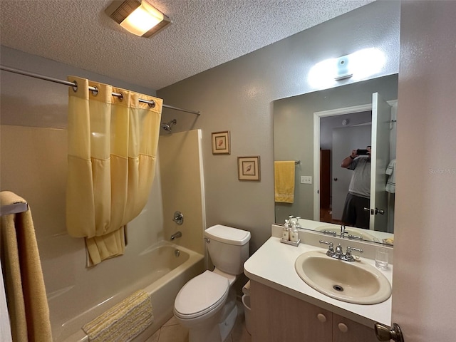 full bath with toilet, shower / bathtub combination, a textured ceiling, and vanity