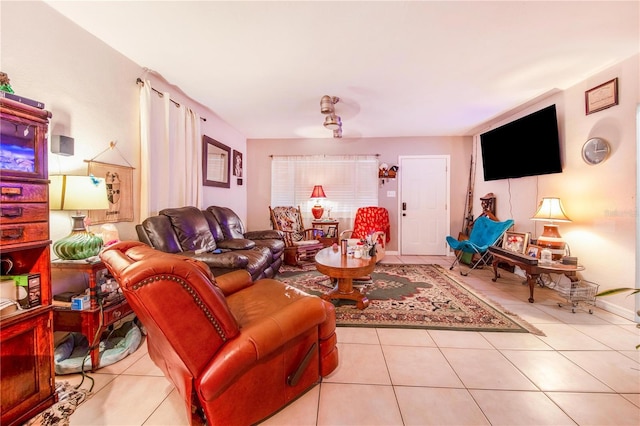 living area with tile patterned flooring