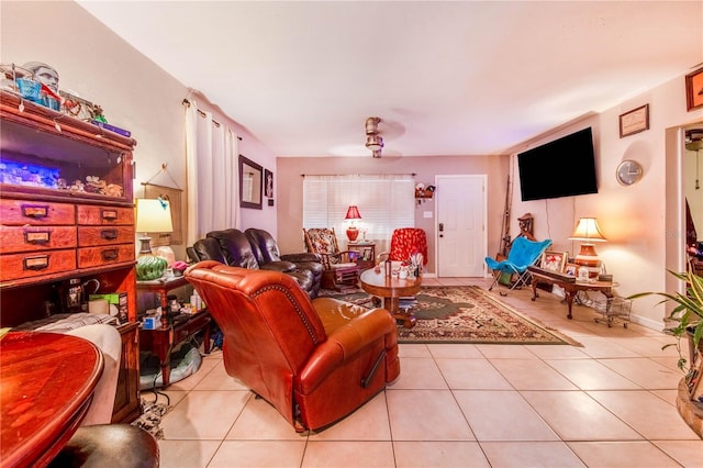 living area featuring tile patterned flooring