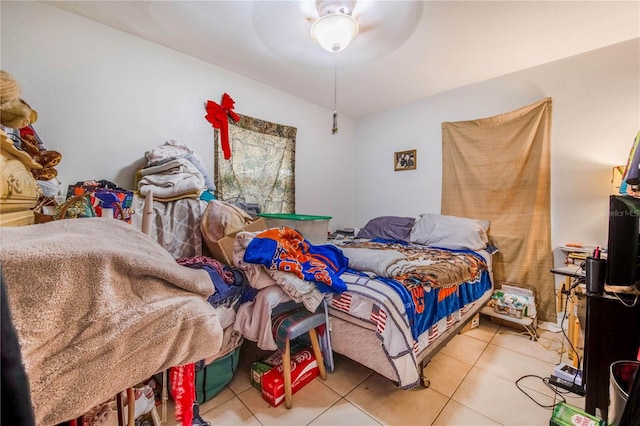 bedroom with tile patterned flooring and a ceiling fan