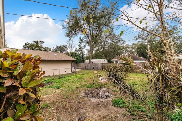 view of yard featuring fence