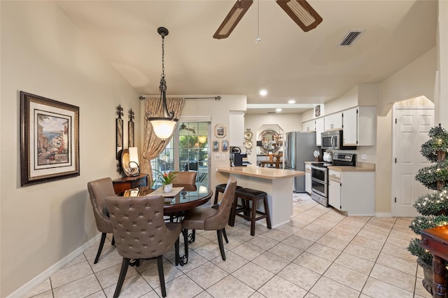 dining room featuring recessed lighting, visible vents, baseboards, and light tile patterned floors