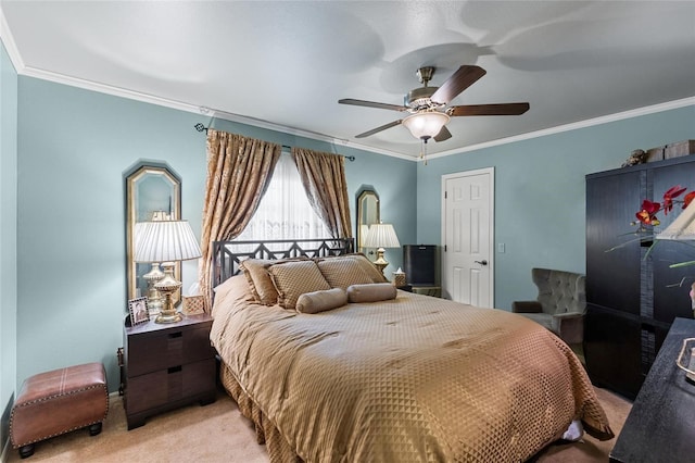 bedroom featuring light colored carpet, crown molding, and ceiling fan