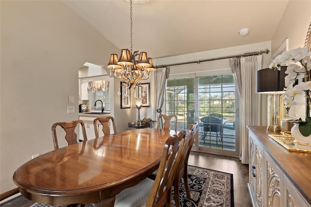 dining area with lofted ceiling and dark wood-type flooring