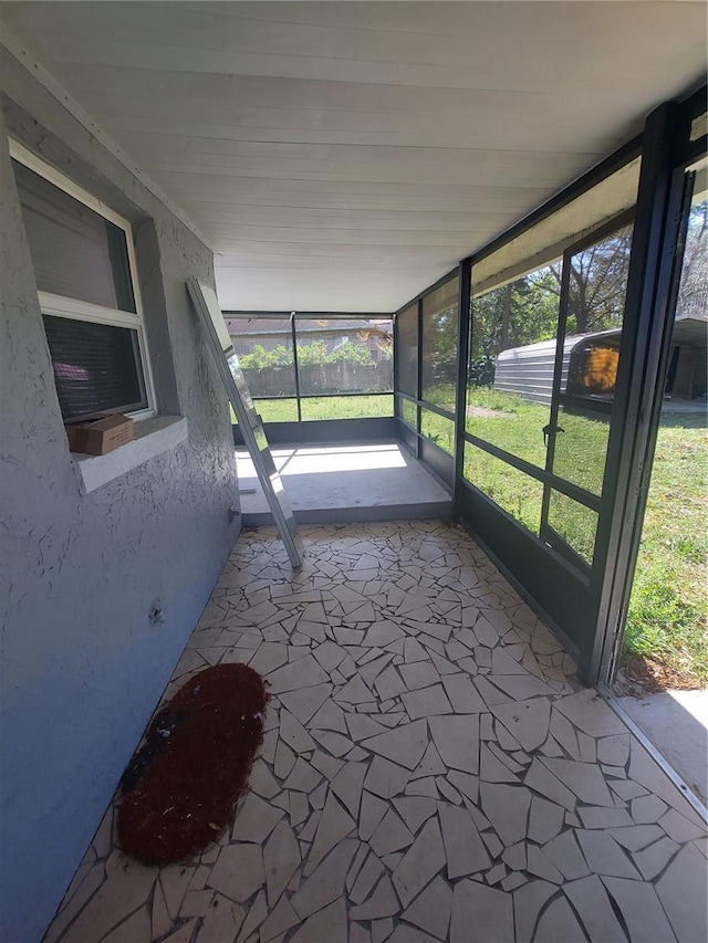 view of unfurnished sunroom