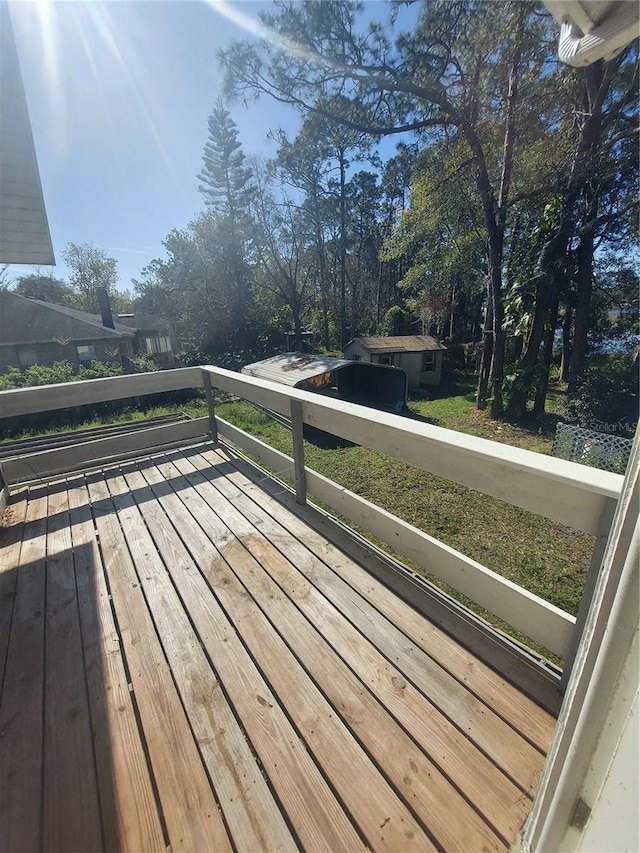 deck featuring an outdoor structure