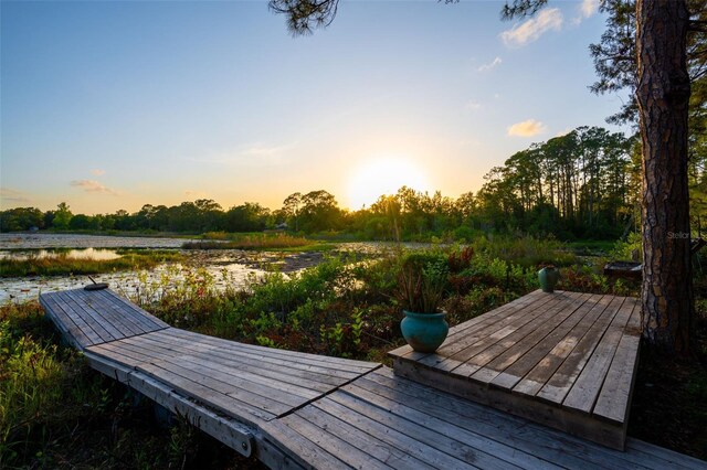 deck at dusk with a water view