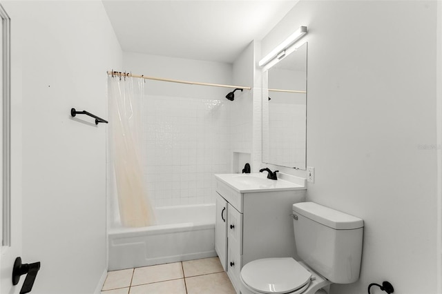 bathroom featuring shower / tub combo with curtain, vanity, toilet, and tile patterned floors