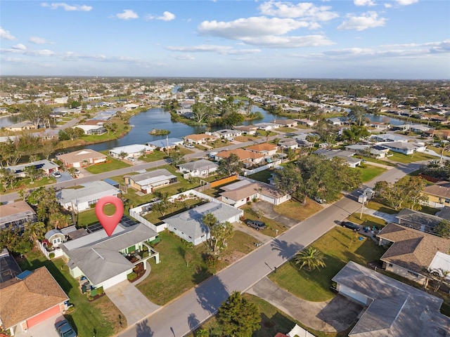 aerial view with a residential view and a water view