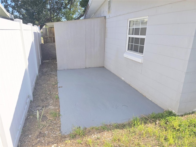 view of patio / terrace with fence